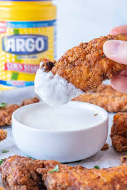 After the buttermilk soak, dredge the chicken pieces in seasoned flour, and fry them in hot oil until crisp and golden. Best Crispy Chicken Tenders A Table Full Of Joy