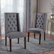 Comfortably curved and with subtle retro styling, the earth pair of dining chairs is the softer side of the popular industrial furniture trend. Billings Tufted Fabric High Back Dining Chairs Set Of 2 Gdfstudio