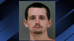 Man arrested after a person was found in car with fatal gunshot wounds,  troopers say