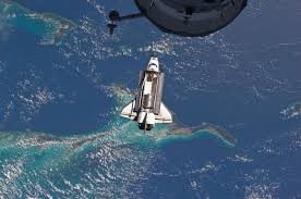 Nasa S Final Flight Of The Space Shuttle Shown Here Docking With The Iss Over The Blue Caribbean On July 10th 2011 Space Pictures Learning Logo Shuttling