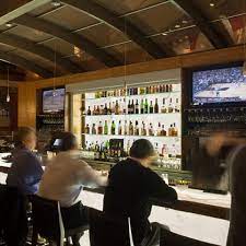 One key ingredient to a successful restaurant is a captivating atmosphere, and the striking backlit acrylic walls at the back. Backlit Acrylic Bar Wall