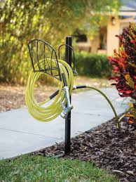 Attach one end of a garden hose to your hose extender, into the pvc fitting and the other end to your outside faucet. Deluxe Post Faucet With Gothic Hose Hanger Gardener S Supply