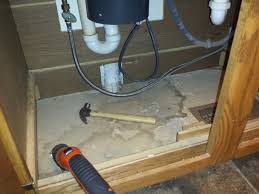 replace wood under kitchen sink