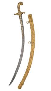 A gilt-copper hilted steel sword ...