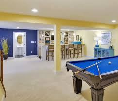 Cheerful Beach Cottage Basement Paint Colors Sherwin Williams Sw6687 Lantern Light Accent Wall Behi Basement Colors Basement Painting Basement Color Schemes