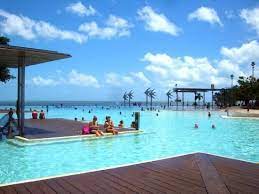 Watch the world go by from a bustling café, stroll along the boardwalk or take a dip in the esplanade lagoon that overlooks the waterfront. Cairns Esplanade Swimming Lagoon Beautiful Seaside Lagoon Cairns Australia Http Www Tripadvisor Com Au Showfo Australia Travel Cairns Cairns Australia