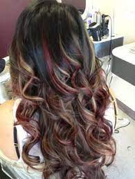 One more positive side of adding highlights is that it also gives a wavy texture to your dull hair and makes them shine with a. Dark Hair With Caramel And Red Highlights Hair Styles Hair Hair Highlights