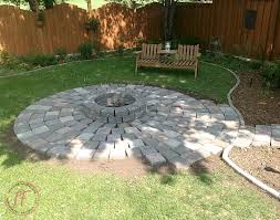 Some fire pit tables can be shipped to you at home, while others can be picked up in store. A Backyard Fire Pit Refresh With Roman Pavers Interior Frugalista