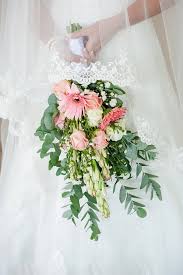 The combination is best for a spring/summer outdoor wedding. Coral And Green South African Wedding Damor Photography
