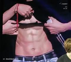 Jungkook flashed his abs on live tv!! Bts Bless Armys By Showing Off Their Rock Hard Abs At Recent Concert