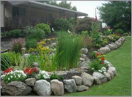 For instance, nearly every front yard benefits from utilizing a mixture of evergreens and colorful seasonal flowers. Borders And Retaining Walls Premier Ponds Maryland 39 S 1 Provider Landscaping With Rocks Landscape Edging Stone Landscape Edging