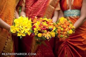 Indian Hindu Wedding With Orange And Yellow Flowers With A Bit Of Red And Aqua Indian Wedding Flowers Flower Bouquet Wedding Spring Wedding Bouquets