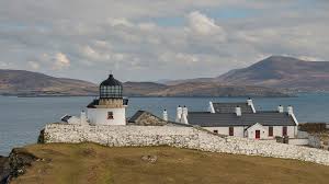 Clare Island Lighthouse Offering Boutique Accommodation Places To Stay In Ireland Cool Places To Visit Driving In Ireland