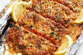 This oven baked salmon recipe works well with sauteed garlic zucchini. Honey Garlic Baked Salmon Recipe Baked Salmon In Foil Recipe Eatwell101