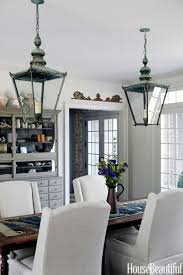 A golden glow almost emanates from this luxury formal dining room design. 15 Dining Room Lighting Fixtures Stylish Ideas For Dining Room Lights