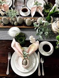 Follow this below showcased idea by placing an arrangement of white flowers on a glass dining table. Concrete Eggs Easter Table Decorations Easter Table Easter Dinner Table