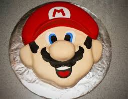 Super mario birthday cake by claire's cakes birthday cake with mario and detailing around side. Mario Birthday Cakes And Cupcakes Ashlee Marie Mario Birthday Cake Mario Bros Cake Super Mario Cake