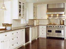 Playing with tones can give your white cabinets a variety of moods and feels. Plain And Simple White Kitchen Decor Kitchen Design Kitchen Design Plans