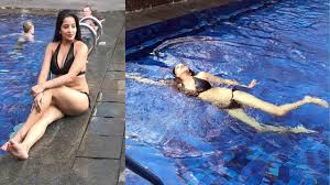 Monalisa looks smoking hot in black bikini as she spends her day off in a  swimming pool