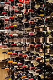 Comprised of cables made from the finest grade of stainless steel secured by top and bottom tension set mounts and connecting clamps made of solid brass with brushed nickel and chrome finishes, this superior and luxurious wine racking system is sure to enhance the visual impact and. The Cable Wine System Adds Sophistication And Flair To Any Wine Collection