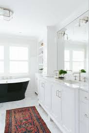 Get impressive iron cast tubs at alibaba.com and enjoy exceptional deals and discounts. White Bathroom With Black Cast Iron Tub Transitional Kitchen