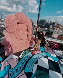 The Graduate Nashville Hotel Just Opened Its Dolly Parton Inspired Rooftop Bar White Limozeen Nashville Hotels Travel Usa Rooftop Bar