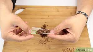 A quick video showing you how to roll a cigarette, a cheaper alternative. How To Roll A Cigarette With Pictures Wikihow