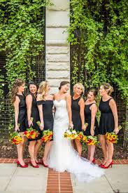 Black Variety Bridesmaid Dresses With Sunflower Bouquets And Red Pumps Red Sunflower Wedding Black Bridesmaid Dresses Fall Red Yellow Weddings