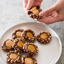 Add the dry ingredients to the wet ones, 1/2 cup at a time, until well mixed. Chocolate Turtle Cookies Cook S Country