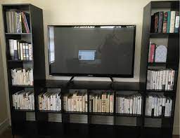 We combined two 5 cube tower bookshelves with one 6 cube bookshelf (with a larger top center compartment to fit our cable box) to make an entertainment center for the kids playroom. Office Update With Mainstays Cube Storage Home Entertainment Center