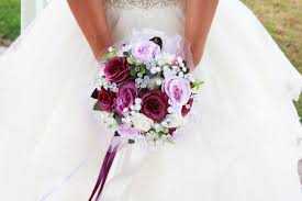 Now, cut this off, this extra ribbon, were going to leave just a little bit of a tail, and this is where youre going to use your pearl topped boutonniere pins. Trending Now Streaming Ribbons In Wedding Bouquets Ray Hunter Wedding Flowers