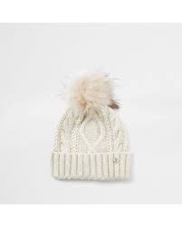 We offer quality styles at the best price and in a sustainable way. River Island Synthetic Beige Cable Knit Beanie Hat In Natural Lyst