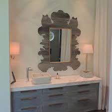 But if your vanity is looking a little lackluster, it may be time for some new bathroom mirror ideas. Offset Bathroom Mirror Design Ideas