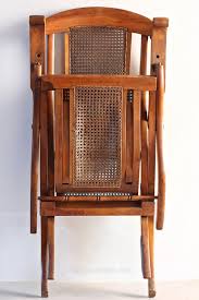 Folding wooden chairs with woven or cane seats and backs, of the type now known in the uk as steamer chairs, began to be used on ocean liner decks from about the 1860s, and were known at the time as deck chairs. Antique Folding Steamer Deck Chair T658 Antiques Atlas