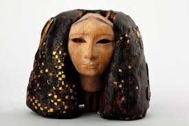 Young woman carrying offerings