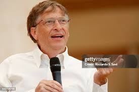 Randy Newcomb and Nicholas Kristof attend "What Can the World Do... News  Photo