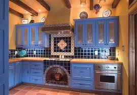 Red kitchen with plenty of light. Mexican Kitchen Muny Woodwork Mexican Kitchen Decor Mexican Style Kitchens Mexican Home Decor