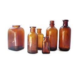The question is, what type of bottle is it and how old is it? Amber Glass Bottles Rustic Old Brown Bottle Collection Medicine Apothecary Bottles Antique Dug Glass Bottles Rustic Vases Wedding Decor Amber Glass Bottles Amber Bottles Glass Bottles