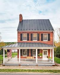 Zinc, copper and steel alloys are commonly used. Traditional 2 Story Red Brick Metal Roof Colonial House