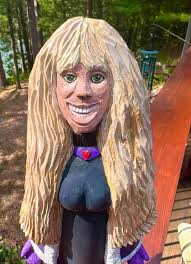 In Michigan we have Heikka Lunta the snow god who summons snow when needed.  This is Heikka Lunta's sister Heidi Lunta! I found her in Kalkaska,  Michigan summoning the snow early. I