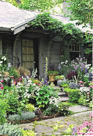Front Porch Plant Some Flowers Then Plant Some More Need Some Concrete Slabs For Pathways Cottage Garden Cottage Garden Design Beautiful Gardens