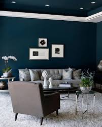 Blue walls and sandy color curtains for a calming atmosphere with a warm touch. Navy Blue And Grey Living Room Walls Novocom Top