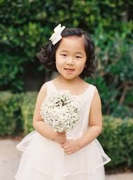 New street style short brown hair cut. Adorable Hairstyle Ideas For Your Flower Girls Martha Stewart Weddings