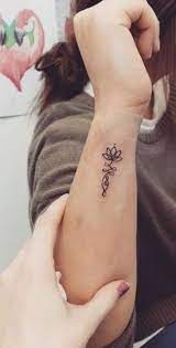 I Would Love This I Absolutely Love The Meaning And Symbolism Of The Lotus Flower Tatouage Tatouage Unalome Tatouage Poignet