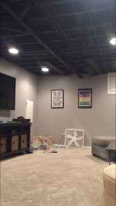 How To Build A Basement Bar Making Your Basement Into An Entertainment Space Basement Remodeling Basement Makeover Unfinished Basement Ceiling