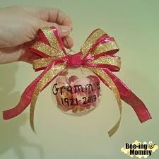 When requesting funeral flowers, you will usually be allowed to choose a small card that will go with them. Preserved Flower Keepsake Christmas Ornament