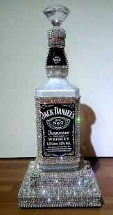 I Bling A Jack Daniels Bottle With A Lot Of Bling And Made Some Nice Led Light At The Feet Of The Bottle Liquor Bottle Crafts Bottle Crafts Wine Bottle Crafts