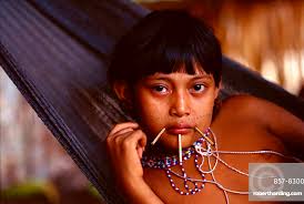Yanomami Indian girl with sticks