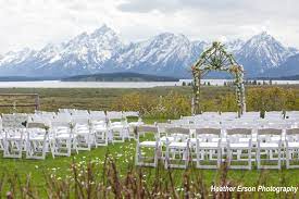 Outdoor Mountain Wedding With A Stunning View Of The Tetons At Jackson Lake Lodge Mountai Mountain Wedding Venues Destination Wedding Locations Wedding Venues