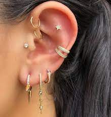 get this rockin look for you next holiday party or just rock it on the daily spikes snakes huggies ch earings piercings ear piercings ear jewelry